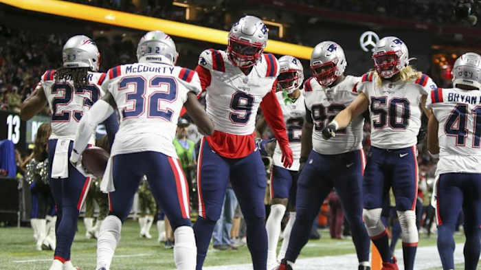 New England Patriots S Devin McCourty (32) and LB Matt Judon (9)